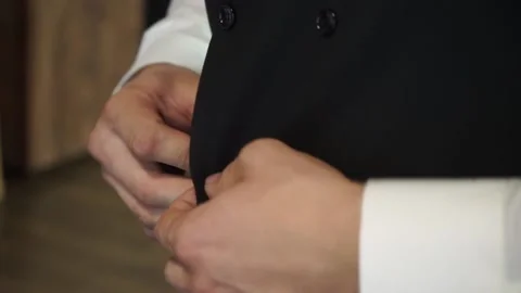 The man zips up his jacket Stock Footage 159896755