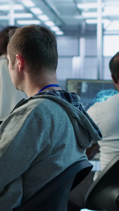 Manager admonishing programmer after making error in data center Stock Footage 319577324