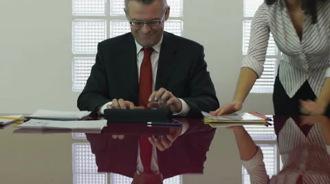Manager and assistant at work in office Stock Footage 1167697