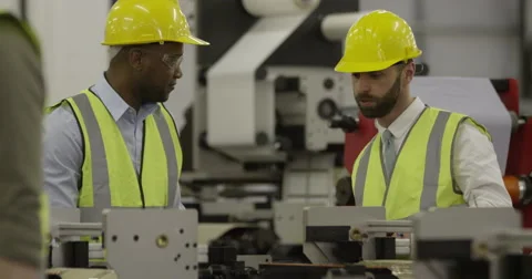 A manager and his foreman in a production factory. Stock Footage 49095989