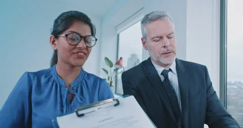 Manager and recruiter asking questions to possible candidate Stock Footage 208046020
