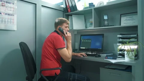 Manager of a building materials mall is on the phone with a customer Stock Footage 159805360