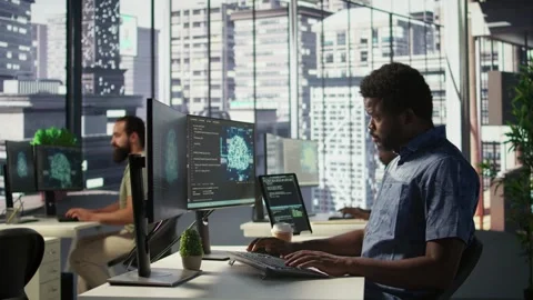 Manager coming to check on progress done by programmer creating AI Stock-Footage 318162470