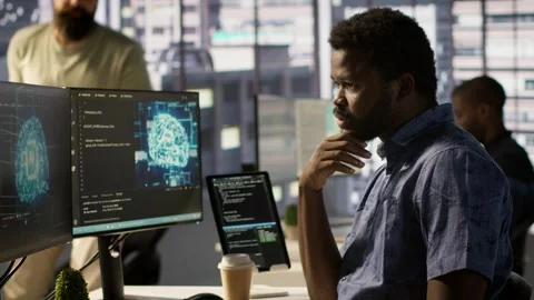 Manager coming to check on progress done by programmer creating AI Stock Footage 318238122