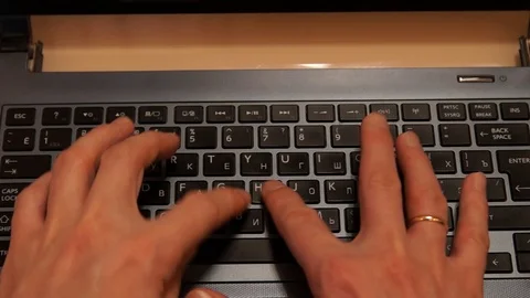 Manager at the computer. Businessman working with laptop. Typing on a keyboard Stock Footage 94250343