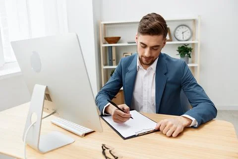 Manager computer desktop work self-confidence paper folder executive Stock Photos