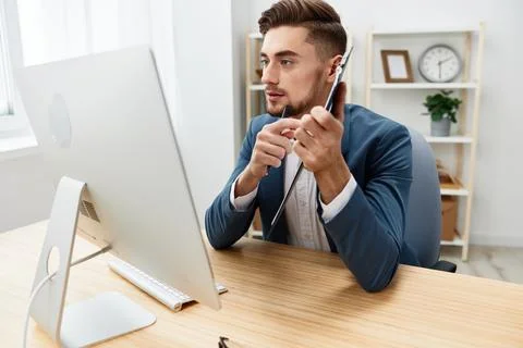 Manager computer desktop work self-confidence paper folder executive Stock Photos