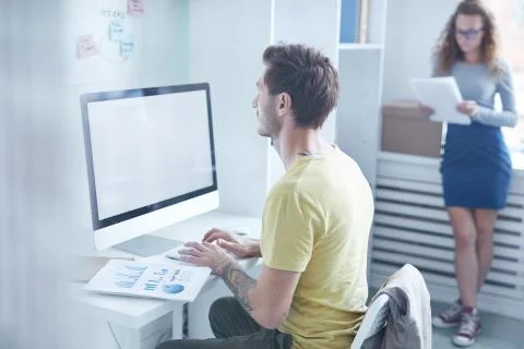 Manager by computer Stock Photos