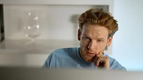 Manager contemplating analyzing data on computer screen at remote office closeup Stock Photos