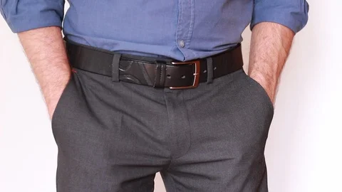 Manager dancing in office hiding hands in pockets Vídeo Stock 92609245