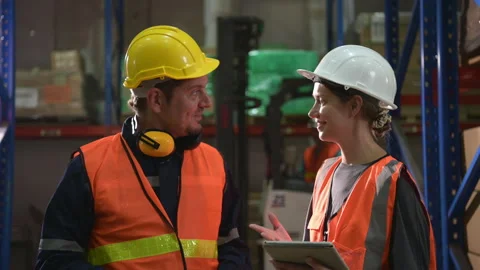 The Manager delivers the report to the foreman and jointly inspects the goods Stock Footage 255226902