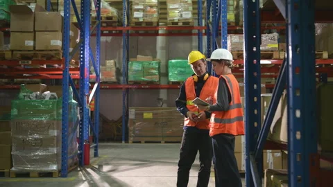 The Manager delivers the report to the foreman Stock Footage 255223545