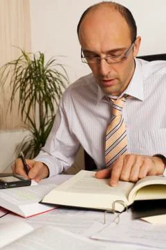 Manager at desk working Foto stock