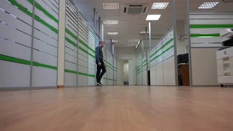 The manager distributed the work to the staff and returned to his office Stock Footage 111515439