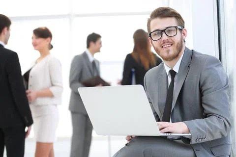 Manager with documents on the background of colleagues Stock Photos