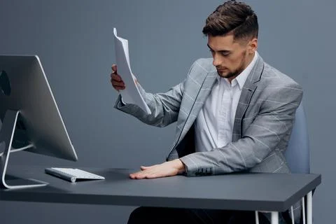Manager documents on the table computer work emotions isolated background Stock Photos