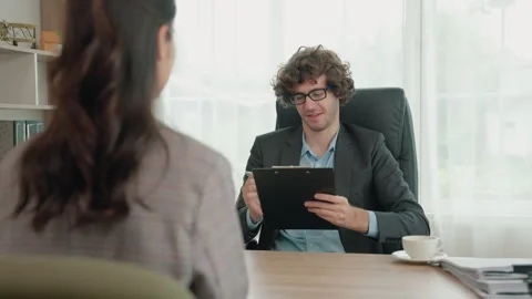 Manager is doing a job interview for a new employee Stock Footage 246611497