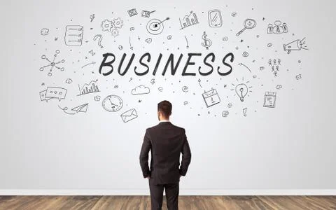Manager in doubt looking to a wall with business concept Foto stock