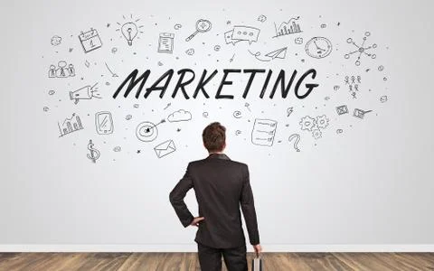 Manager in doubt looking to a wall with business concept 스톡 사진