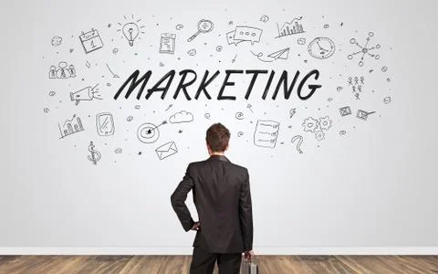 Manager in doubt looking to a wall with business concept Foto stock