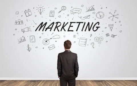 Manager in doubt looking to a wall with business concept Foto stock
