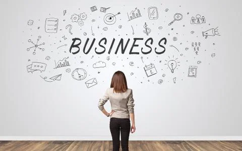 Manager in doubt looking to a wall with business concept 写真素材