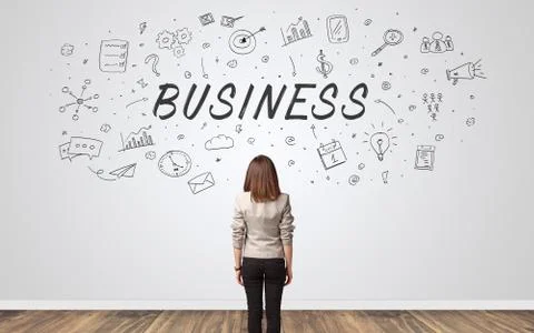 Manager in doubt looking to a wall with business concept Foto stock