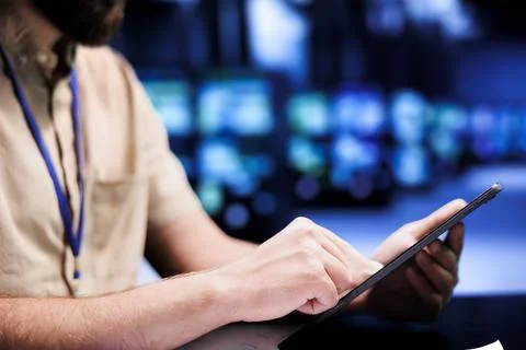 Manager examining supercomputers Stock Photos