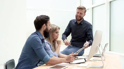 Manager explaining current tasks to employees. close up. Stock Footage 148154538