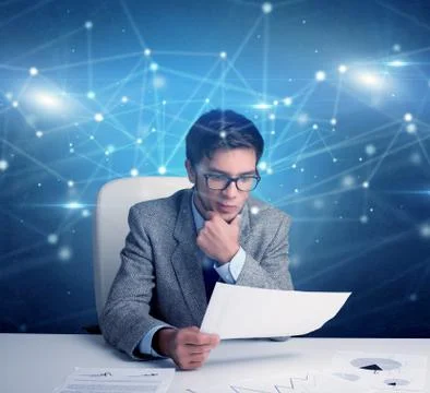 Manager in front of the office desk with link concept Foto stock