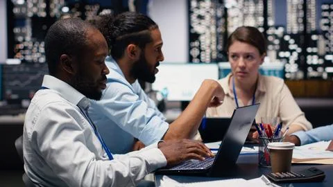 Manager gathering employees in office, evaluating staff performance Stock Photos