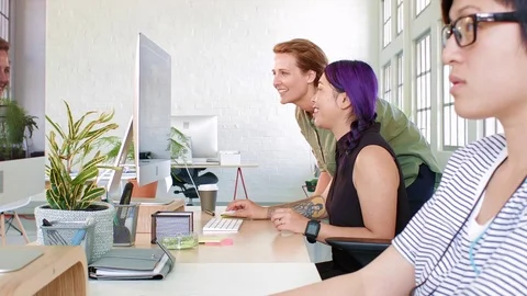 Manager giving some guidance to colleage Stock Footage 71632023
