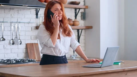 Manager has phone negotiations with client Stock Footage 228594615