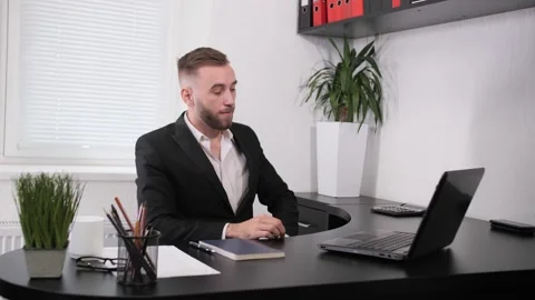 Manager having distance webcam chat job interview on computer in office. Stock Footage 130623910