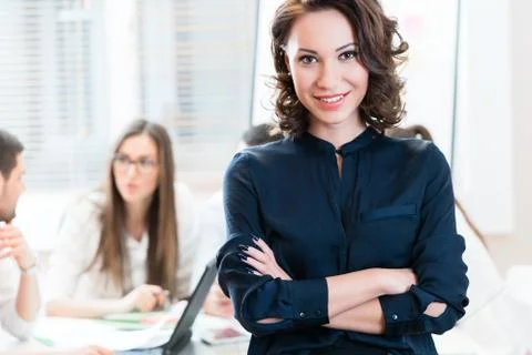 Manager with her team working in the office Stock Photos