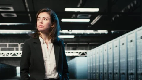 Manager inspecting data center with infrastructure rackmounts Stock Footage 329322354