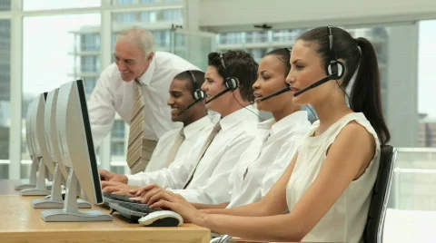 Manager Instructing his Call Center Team Stock Footage 853760