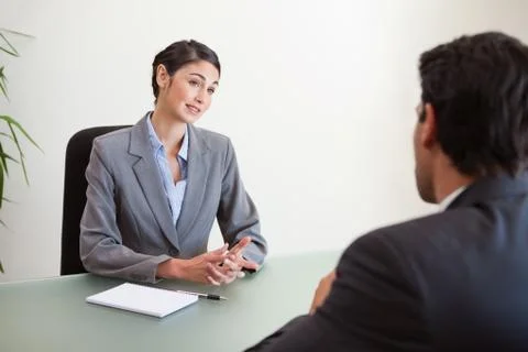 Manager interviewing a good looking applicant Stock Photos