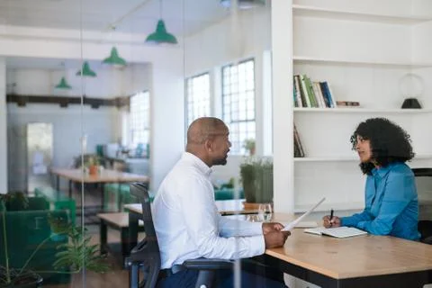 Manager interviewing a potential new employee in her office Stock Photos
