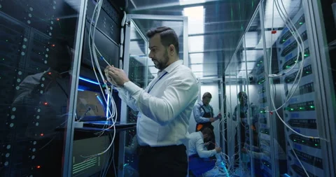 Manager performing an inspection in server room Stock Footage 98008840
