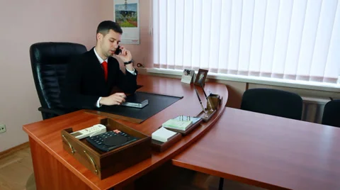 Manager On Phone And Taking Notes Stock Footage 39150447