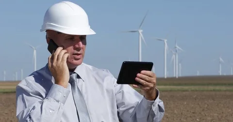 Manager Planning on Mobile Phone Using Touch Pad Connection Teamwork Activity Stock Footage 83657173