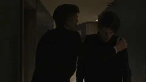 Manager pulling drunk guest of the hotel room to the corridor. Stock clip Stock Photos