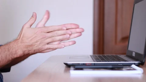 Manager rubbing his hands in office Видео 92609289