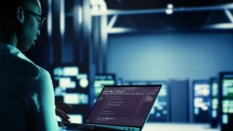 Manager runs code in data center Stock Footage 249562020