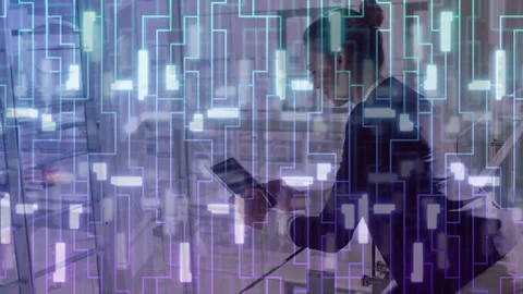 Manager scrolling tablet checking data while walking glass rail digital grid Stock Footage 332544642