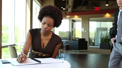 Manager shows employee some writing errors Stock Footage 35872514
