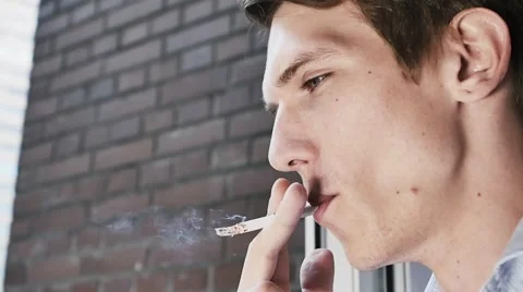 Manager smoking cigarette at work closeup Street background Stock Footage 54936406