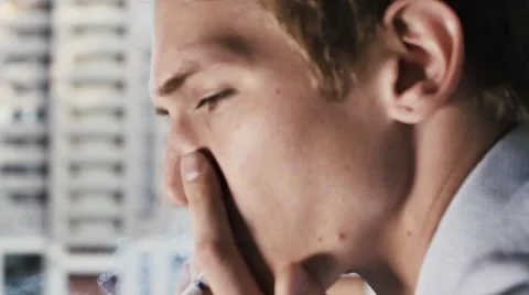 Manager smoking cigarette at work closeup Street background Stock Footage 54936419