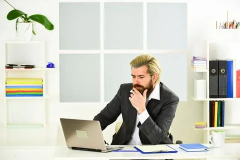 Manager solving business problems. Raising standards. Stock market. Office staff 写真素材